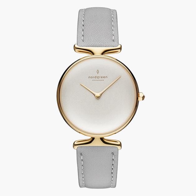 UN28GOLEGRXX UN32GOLEGRXX &Unika gold watches for women with white dial and grey leather strap