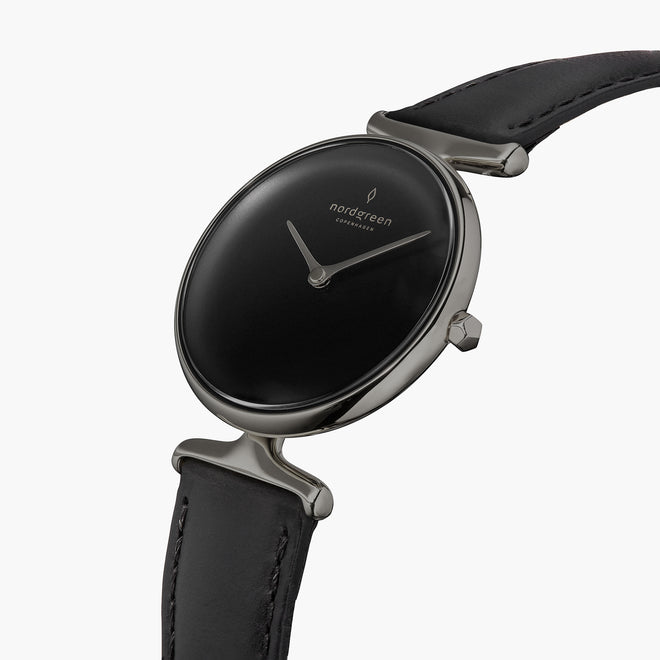 UN28GMLEBLBL UN32GMLEBLBL &Unika black dial women's watch in gunmetal with black leather strap