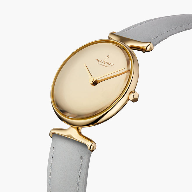 UN28GOLEGRPM UN32GOLEGRPM &Unika gold watches for women with polished dial and grey leather strap