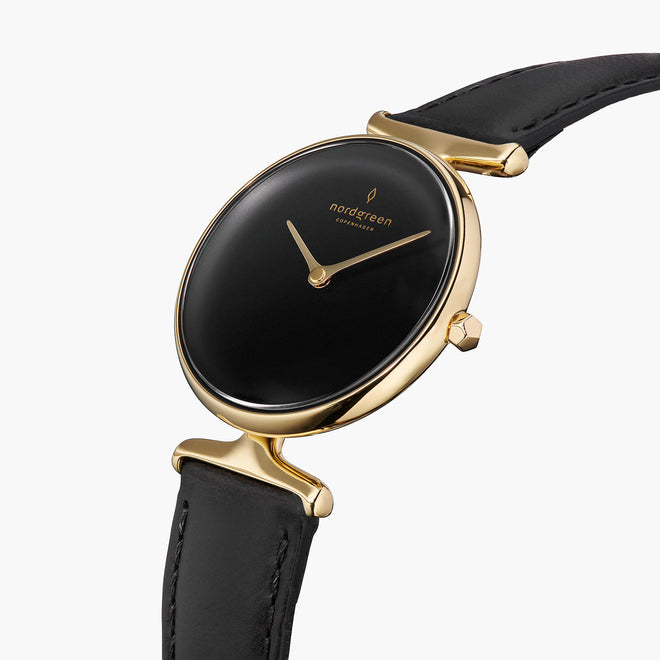 UN28GOVEBLBL UN32GOVEBLBL &Unika gold watches for women with black dial and black vegan strap
